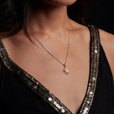 Model wearing the North Star Moonstone Starburst Necklace, showcasing its beauty and significance in spiritual jewelry. This piece symbolizes guidance and charm for meditation and zodiac practices, ideal for anyone seeking meaningful adornment.