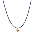 Light Seeker Lapis Starburst Choker Necklace featuring a stunning starburst lapis pendant amidst golden rays, perfect for spiritual jewelry and meditation practices. This elegant piece symbolizes protection and power, embodying the sun's vitality and the essence of meaningful manifestations.