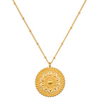 Inner Light Mandala Necklace featuring an intricate mandala pendant, a symbol of spiritual meaning and protection, ideal for meditation and manifestation. This spiritual jewelry shines with a gold plate finish, perfect for yoga enthusiasts.