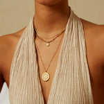 Inner Light Mandala Necklace displayed elegantly on a model, showcasing its intricate mandala pendant designed for spiritual jewelry and meditation. This talisman symbolizes balance and peace, perfect for yoga enthusiasts seeking meaningful charms for manifestation.