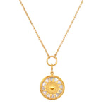 Inward Journey Pearl Mandala Necklace showcasing a stunning gold plate pendant adorned with mother of pearl, symbolizing spirituality and protection, perfect for meditation and meaningful reflection. This talisman is ideal for those seeking a connection with the infinite, enhancing their yoga practice and manifestation journey.