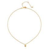 Close-up of the Boundless Love Mini Heart Pendant Necklace displaying its intricate design and gold plating, perfect for spiritual meditation and as a talisman for those seeking individuality and creativity.