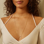 28" Chain Charm Necklace worn elegantly, showcasing its charm holder in a stylish setting. This necklace embodies the essence of spiritual jewelry, talismans, and the meaningful connection to sun and moon energies.