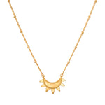 Emergence Gold Sunburst Necklace showcasing an intricate sunburst design, symbolizing vitality and leadership, perfect for spiritual jewelry and meditation, adding meaning and charm to any yoga practice.
