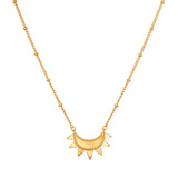 Emergence Gold Sunburst Necklace showcasing an intricate sunburst design, symbolizing vitality and leadership, perfect for spiritual jewelry and meditation, adding meaning and charm to any yoga practice.