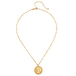 Front perspective of the First Light Gold Medallion Reversible Pendant Necklace displaying an elegant sun design, embodying the essence of spiritual jewelry for zodiac and meaningful manifestation.