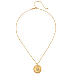 Back view of the First Light Gold Medallion Reversible Pendant Necklace, highlighting its intricate design and symbolism of nourishment and protection, perfect for spiritual and meditation journeys.