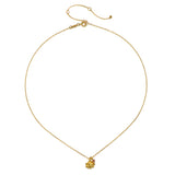 Close-up of the Bloom in Peace Lotus & Tourmaline Necklace, displaying the 18kt gold plate lotus pendant accented by a pink tourmaline gemstone. This piece of spiritual jewelry is perfect for those seeking balance and meaning in their meditation and manifestation practices.