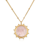 Unlimited Compassion Rose Quartz Gemstone Necklace featuring a stunning rose quartz pendant set in gold, perfect for spiritual jewelry and meditation, representing unconditional love and protection, ideal for yoga enthusiasts and those interested in meaningful manifestation.
