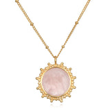 Unlimited Compassion Rose Quartz Gemstone Necklace featuring a stunning rose quartz pendant set in gold, perfect for spiritual jewelry and meditation, representing unconditional love and protection, ideal for yoga enthusiasts and those interested in meaningful manifestation.