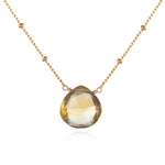 Brighter Than Sunshine Citrine Necklace featuring a radiant citrine briolette, ideal for spiritual jewelry and meditation. This meaningful piece serves as a talisman for protection and manifestation, embodying the essence of the sun. Perfect for yoga practitioners and those seeking deeper spiritual connections with zodiac meanings.