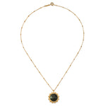 Elegant Pursue Your Truth Labradorite Necklace on a plain backdrop, showcasing the intricate labradorite pendant surrounded by golden details, making it a perfect choice for those interested in meaningful spiritual jewelry and manifestation.