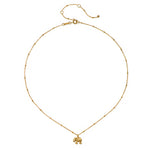The Stand in Strength Elephant Necklace displayed in a flat lay format, highlighting its delicate gold beaded chain, making it a beautiful choice for protective and sacred spiritual jewelry.