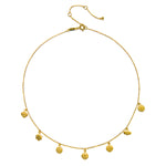Close-up view of the Aligned in Harmony Chakra Choker, showcasing its intricate design with gold-plated chakra symbols. This necklace represents spiritual jewelry, perfect for meditation and a meaningful addition to any zodiac or yoga enthusiast's collection.
