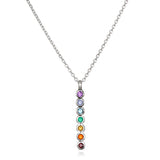 Divine Alignment Gemstone Chakra Silver Necklace featuring seven colorful gemstones representing the chakras, ideal for spiritual jewelry, meditation gifts, and symbolic meaning. Perfect for yoga and manifestation enthusiasts.