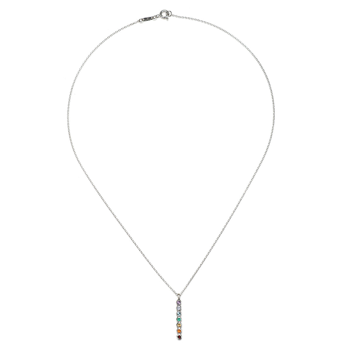 Front view of the Divine Alignment Gemstone Chakra Silver Necklace, showcasing a vertical pendant with a rainbow of gemstones for balance and harmony, a meaningful piece for sacred practices like yoga and mantra.