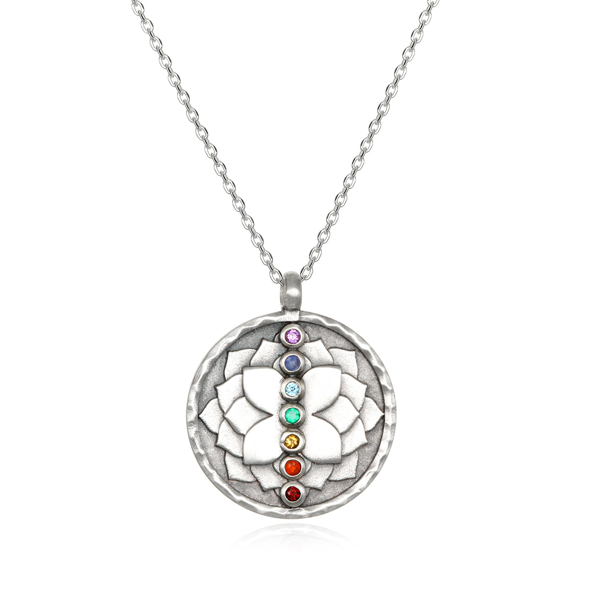 Divine Alignment Gemstone Chakra Silver Necklace featuring a hand-etched lotus relief, showcasing seven vibrant gemstones representing the chakras. This spiritual jewelry is an ideal meditation gift, embodying meaningful symbolism for yoga practitioners, and serves as an amulet for manifestation and protection. Its sacred design holds significance for zodiac enthusiasts, making it a perfect addition to any collection.
