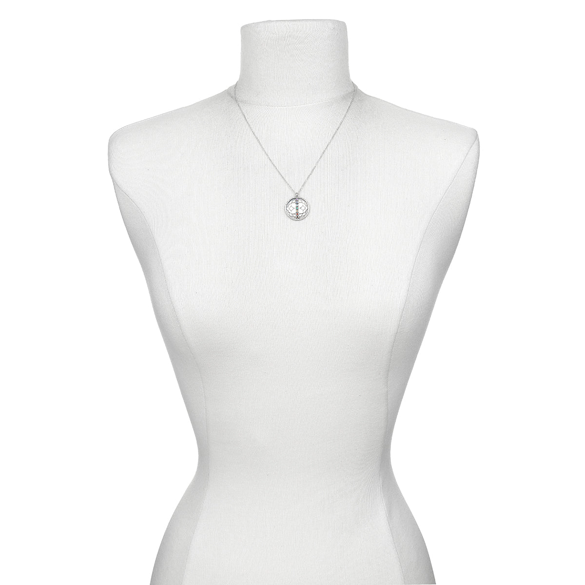 The Divine Alignment Gemstone Chakra Silver Necklace elegantly displayed on a mannequin, illustrating its symbolic meaning and connection to the zodiac, making it an ideal choice for meaningful gifts in the realm of spirituality and yoga.
