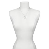 The Divine Alignment Gemstone Chakra Silver Necklace elegantly displayed on a mannequin, illustrating its symbolic meaning and connection to the zodiac, making it an ideal choice for meaningful gifts in the realm of spirituality and yoga.