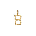 An elegant Initial Letter Charm shaped as the letter 'B', made from 18kt gold plating, symbolizing protection and intention in spiritual jewelry pursuits.