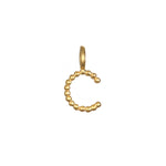 The letter 'C' Initial Letter Charm in 18kt gold plating, a unique addition to spiritual jewelry collections, enhancing meditation, yoga, and meaningful expressions of self.