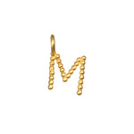 Initial Letter Charm shaped like an 'M', perfect for personalized spiritual jewelry, that embodies the essence of manifestation and holds the meaning of your intentions.