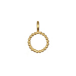 Initial Letter Charm in a gold-plated circular design, an excellent complement to your spiritual jewelry. This charm symbolizes protection and can be used in malas for meditation, enriching your spiritual meaning and practices.