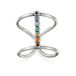 Divine Alignment Silver Chakra Ring featuring vibrant gemstones representing the seven chakras. This spiritual jewelry is perfect for meditation gifts, symbolizing meaningful and protective energy for yoga practices. A beautiful amulet that reflects the manifestation and deeper meaning of sacred energy, connecting wearers to their zodiac and spiritual journey.