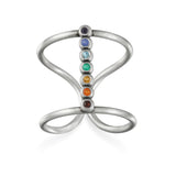 Divine Alignment Silver Chakra Ring featuring vibrant gemstones representing the seven chakras. This spiritual jewelry is perfect for meditation gifts, symbolizing meaningful and protective energy for yoga practices. A beautiful amulet that reflects the manifestation and deeper meaning of sacred energy, connecting wearers to their zodiac and spiritual journey.