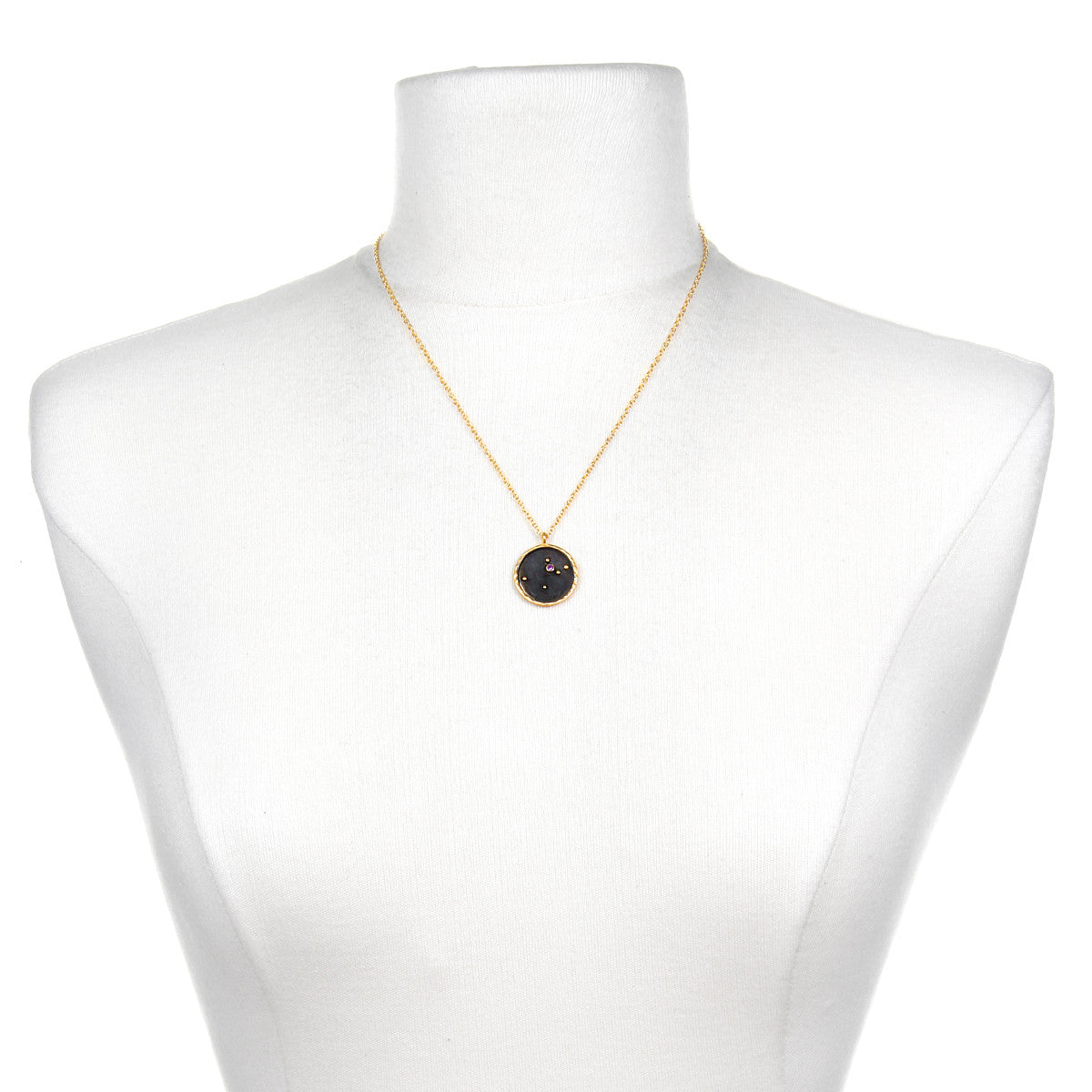 Aquarius Zodiac Necklace displayed on a mannequin, showcasing its pendant. This significant spiritual jewelry embodies the essence of the zodiac with its symbolic meaning, perfect for spiritual seekers and yoga practitioners as a meaningful amulet.