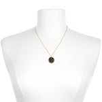 Taurus Zodiac Necklace displayed on a mannequin, showcasing its elegant design and 18kt gold plating. This symbolic jewelry piece is not just a beautiful accessory but also a manifestation tool, making it a perfect gift for lovers of yoga and spirituality. Its essence ties deeply to the Taurus zodiac's sacred qualities.
