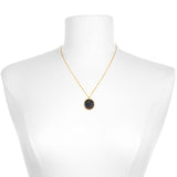 Taurus Zodiac Necklace displayed on a mannequin, showcasing its elegant design and 18kt gold plating. This symbolic jewelry piece is not just a beautiful accessory but also a manifestation tool, making it a perfect gift for lovers of yoga and spirituality. Its essence ties deeply to the Taurus zodiac's sacred qualities.