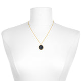 The Leo Zodiac Necklace elegantly displayed on a mannequin. This stunning spiritual jewelry piece serves as a meditation gift and a meaningful amulet, embodying the essence of yoga, protection, and the zodiac's power.