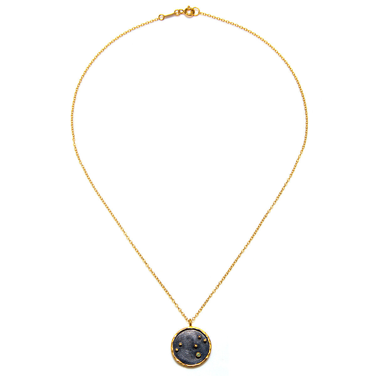 Close-up of the Leo Zodiac Necklace on a gold chain, highlighting its sacred pendant. This piece of spiritual jewelry is ideal for those seeking meaningful connections in meditation and yoga practices, offering a protective and symbolic touch.