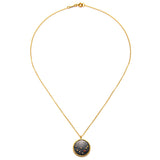 The Capricorn Zodiac Necklace laid flat, emphasizing the intricate detailing of the pendant along with its gold finish. This meaningful piece merges spirituality with style, making it perfect for yoga and manifestation.