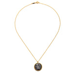 Virgo Zodiac Necklace displayed with a simple yet elegant design, featuring a black pendant on a gold chain, a symbolic piece for manifestation and meditation, and a thoughtful addition to spiritual jewelry collections.