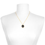Stylish Aries Zodiac Necklace showcased on a mannequin, highlighting its gold chains and deep gemstone pendant. Ideal as spiritual jewelry, this piece is perfect for meditation gifts, embodying meaningful symbolism for yoga and manifestation.