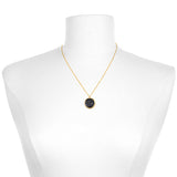 Stylish Aries Zodiac Necklace showcased on a mannequin, highlighting its gold chains and deep gemstone pendant. Ideal as spiritual jewelry, this piece is perfect for meditation gifts, embodying meaningful symbolism for yoga and manifestation.