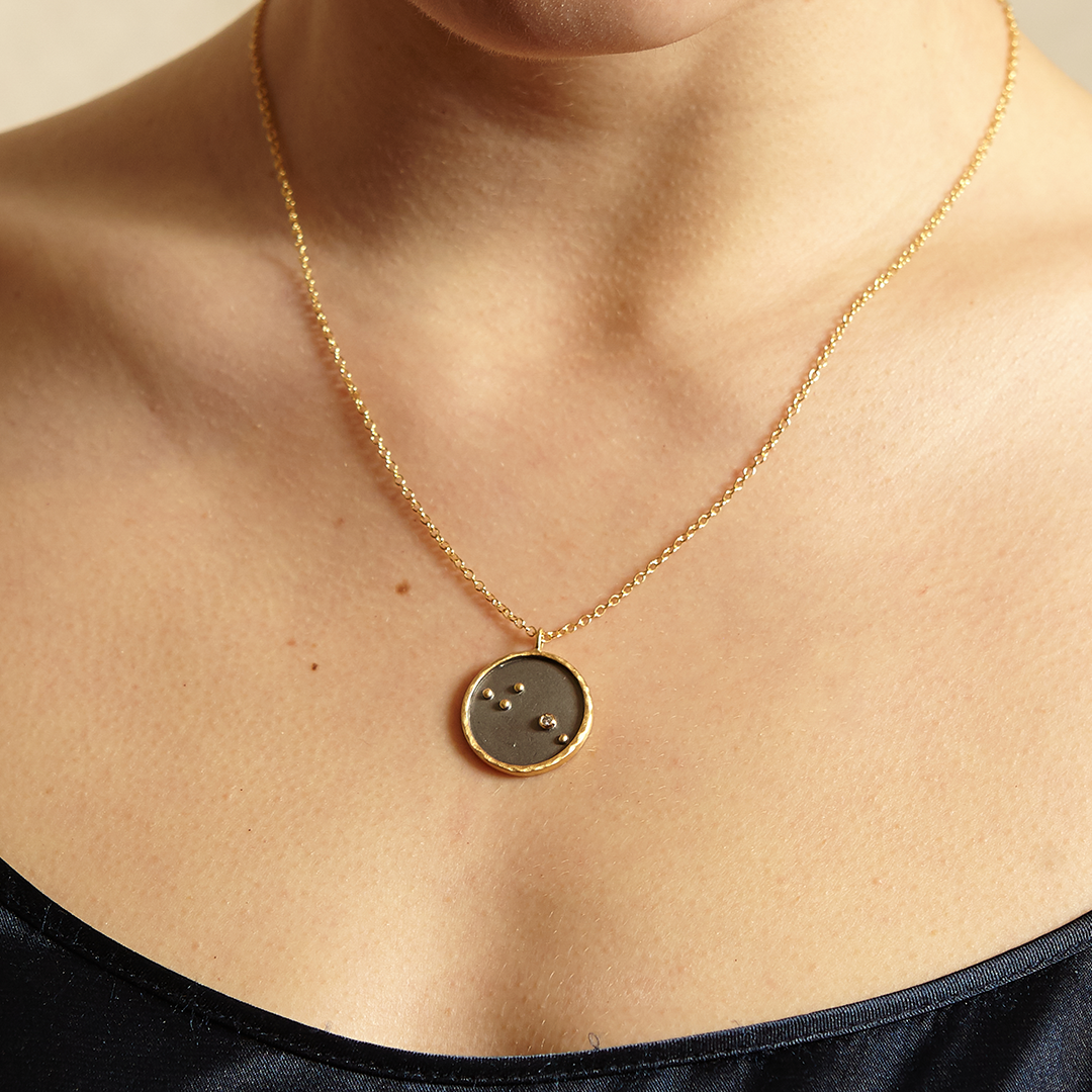 Close-up of the Leo Zodiac Necklace worn elegantly, showcasing its unique pendant design. This symbolic jewelry piece is ideal for those seeking spiritual connection, meditation gifts, or a stylish addition to their yoga attire. Its meaning as a protective sacred amulet resonates deeply with the essence of Leo.